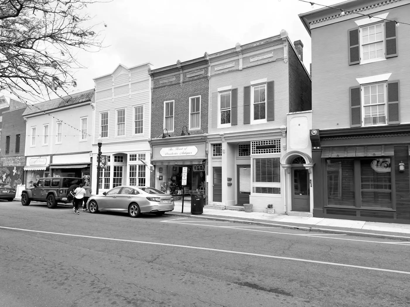 A row of small-town storefronts along a Central Valley main street